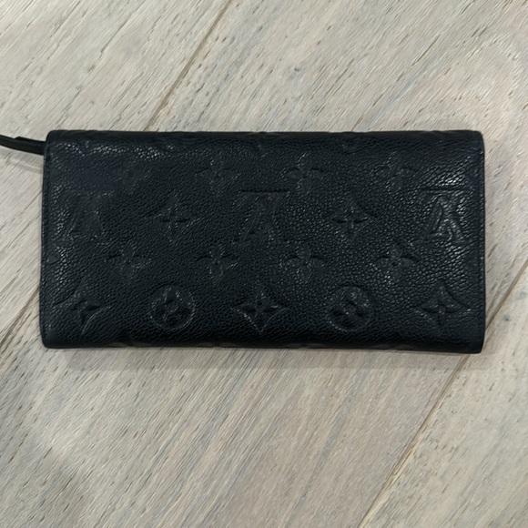 Authentic the Monogram Empreinte Leather wallet - like new - Picture 2 of 7